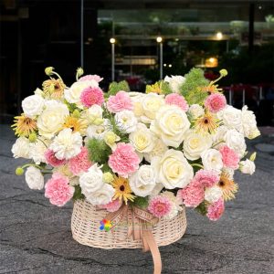 Beautiful flower basket in white and pink