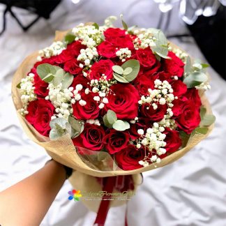 Cute mix of red roses and white baby's breath