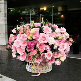 Cute pink flower basket, same-day delivery to saigon