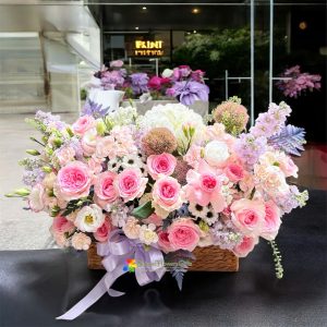 Send a basket of pink flowers to Saigon
