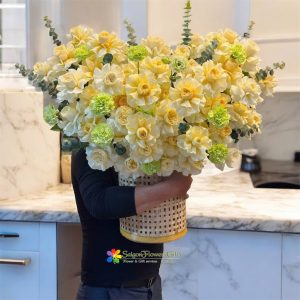 Basket of vibrant yellow flowers