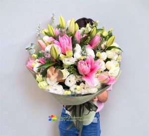 Delicate mixed bouquet of pink lilies
