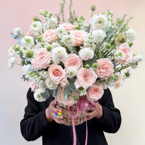 Lovely basket of white and pink flowers