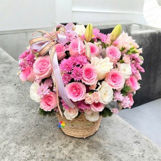 lovely pink and purple flower basket delivery in saigon