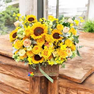 Sunflower and rose flower basket