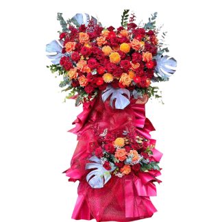 Congratulatory flowers in vibrant red-orange tones