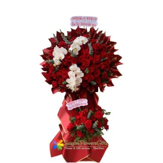 red-toned flowers for a grand opening